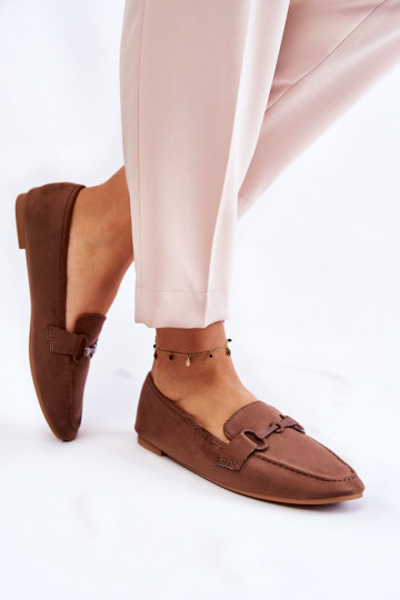 Mocassins met ornamenten...