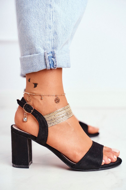 Zwarte suède sandalen met gouden...