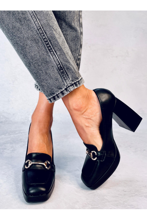 Een stijlvolle schoen met dikke hak...