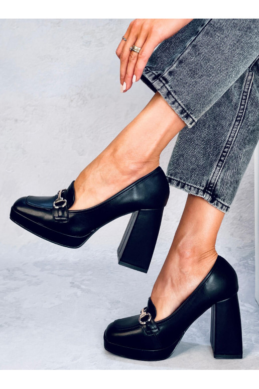 Een stijlvolle schoen met dikke hak...