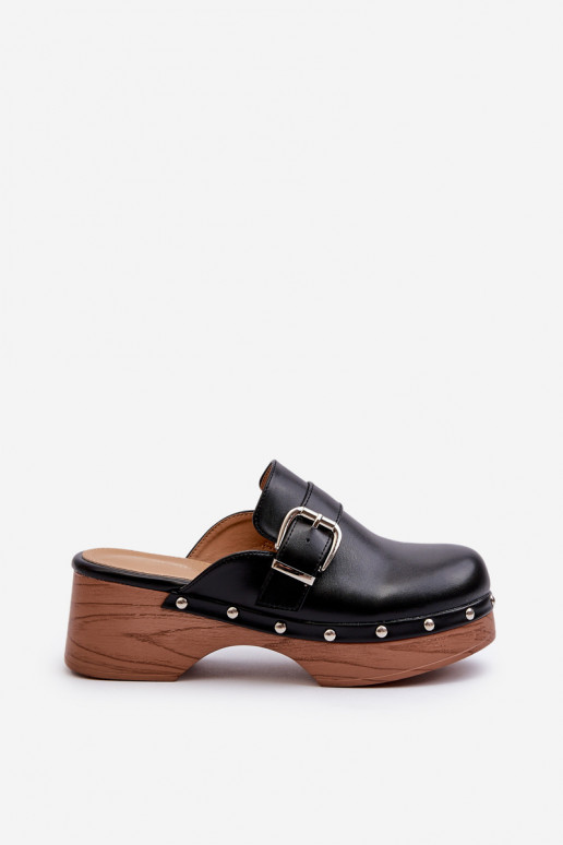 Slippers met gespen in de kleur zwart...