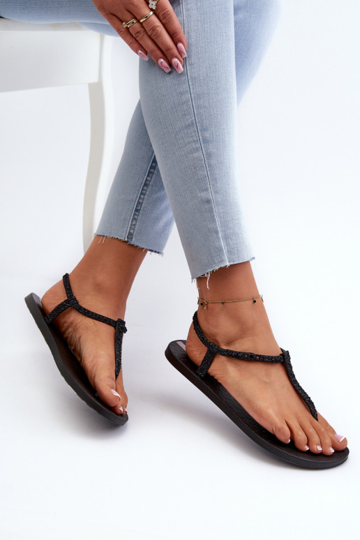Sandalen over de teen met glans in de... Sandalen over de teen met glans in de...