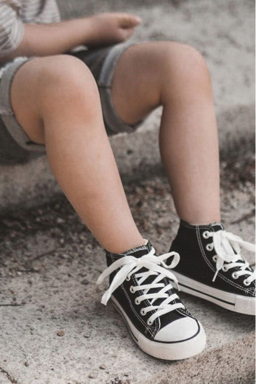 Kinderschoenen met zwarte zolen