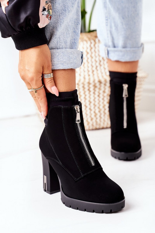 Verwarmde laarzen met hakken in het zwart Wonder Woman Verwarmde laarzen met hakken in het zwart Wonder Woman