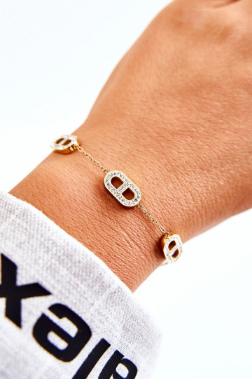 Damesarmband met fonkelende ogen in goudkleur 2