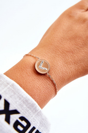Damesarmband met ornamenten en zirkonia ogen in roze goud 2
