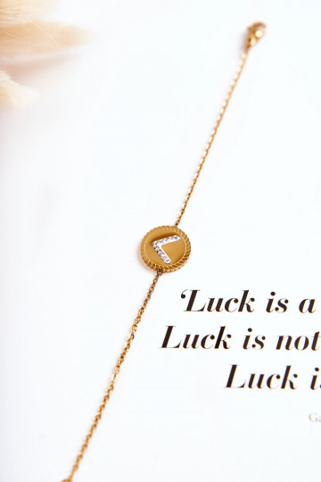 Damesarmband met ornamenten en zirkonia ogen in goudkleur