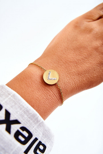 Damesarmband met ornamenten en zirkonia ogen in goudkleur 2