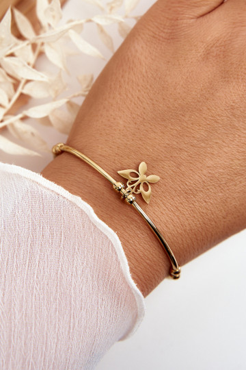 De armband is goud