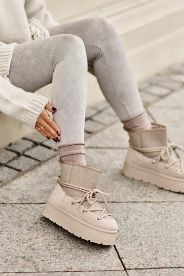 Sneeuwlaarzen met stijlvolle details en plateau in beige