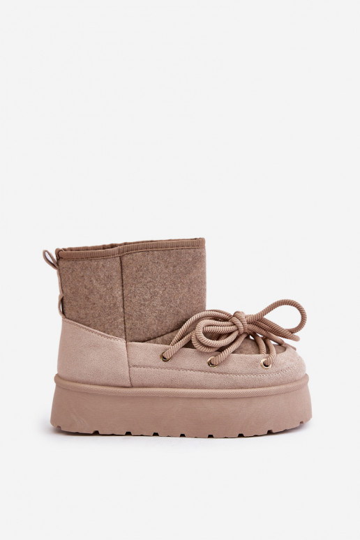 Zandkleurige Sneeuwlaarzen Met... Zandkleurige Sneeuwlaarzen Met...