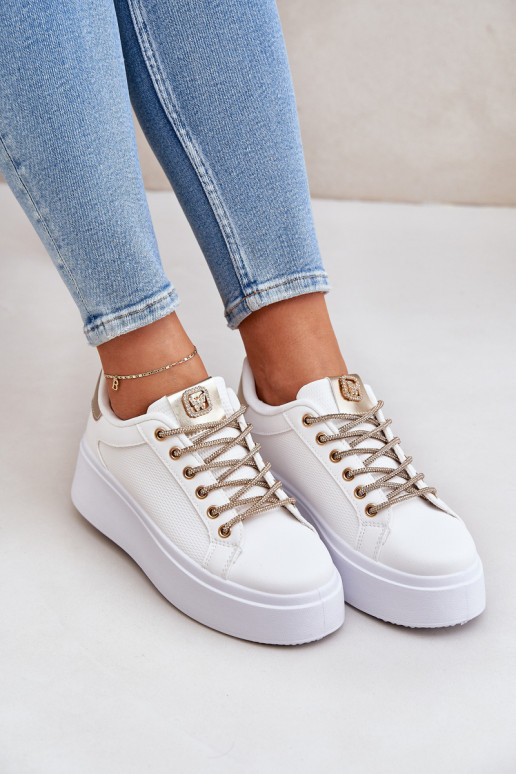 Sneakers model schoenen met platform Met sierlijki SznuróInkami INit-gouden kleur Fonetha Sneakers model schoenen met platform Met sierlijki SznuróInkami INit-gouden kleur Fonetha