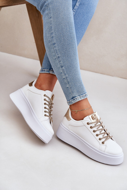 Sneakers model schoenen met platform Met sierlijki SznuróInkami INit-gouden kleur Fonetha Sneakers model schoenen met platform Met sierlijki SznuróInkami INit-gouden kleur Fonetha