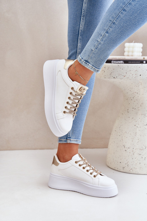 Sneakers model schoenen met platform Met sierlijki SznuróInkami INit-gouden kleur Fonetha Sneakers model schoenen met platform Met sierlijki SznuróInkami INit-gouden kleur Fonetha