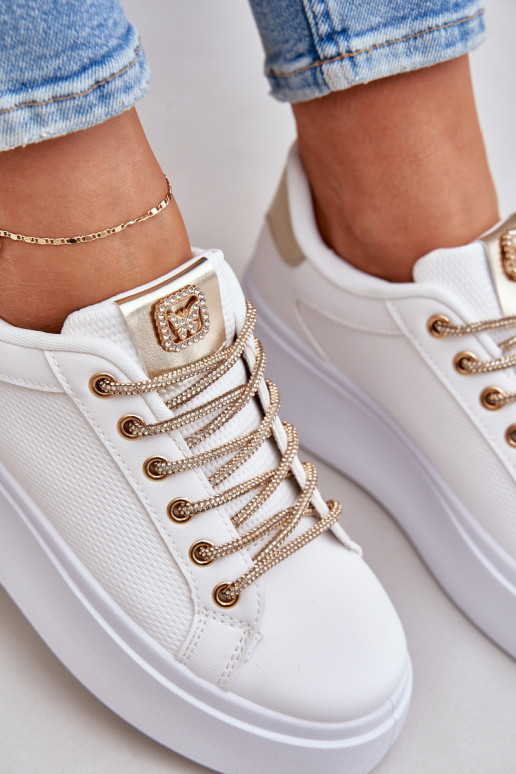 Sneakers model schoenen met platform Met sierlijki SznuróInkami INit-gouden kleur Fonetha Sneakers model schoenen met platform Met sierlijki SznuróInkami INit-gouden kleur Fonetha