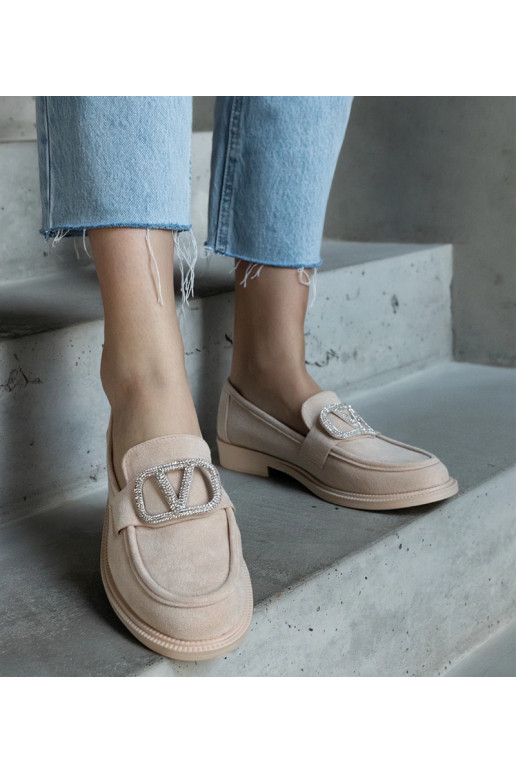 Beige mokkasiner dekoreret med...