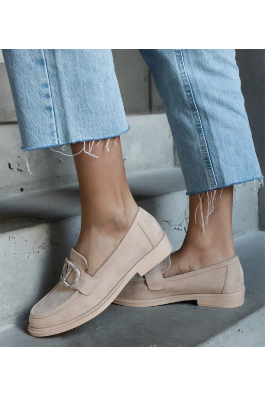 Beige mokkasiner dekoreret med...