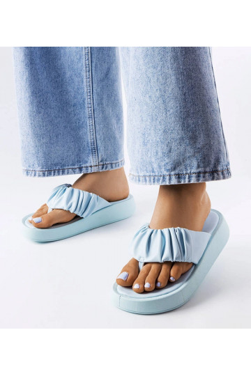 Filena blå rynkede flip-flops