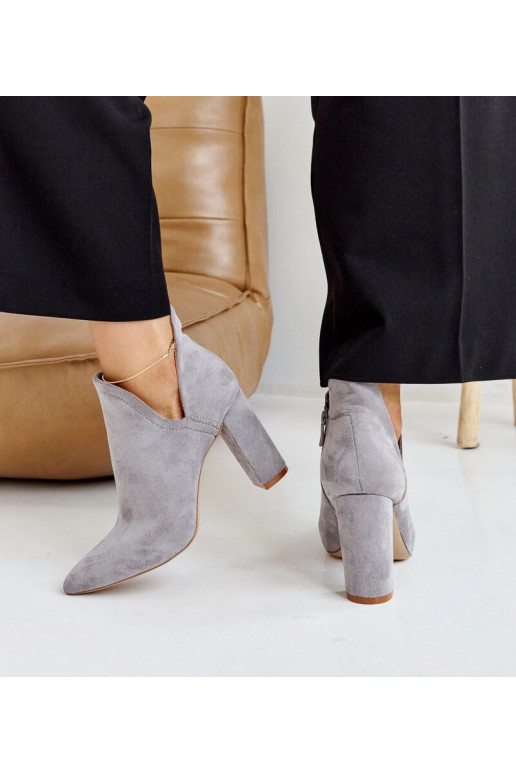 Taylans grå asymmetriske ankelstøvler...