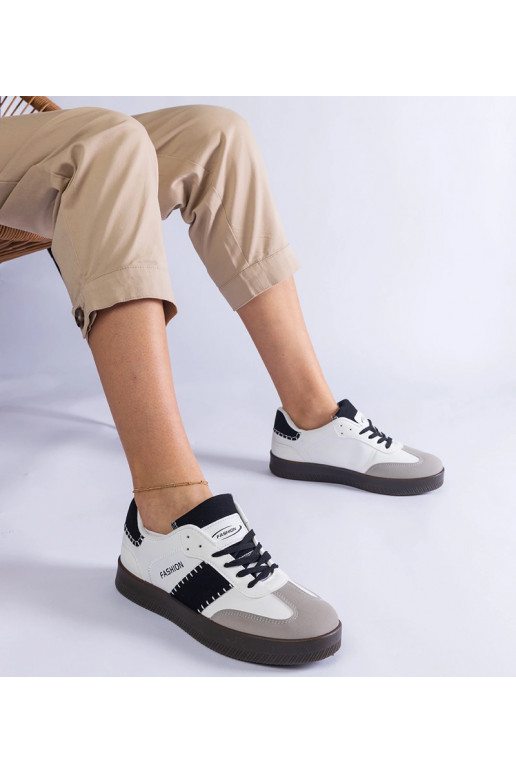 Witte sneakers op plateau met...