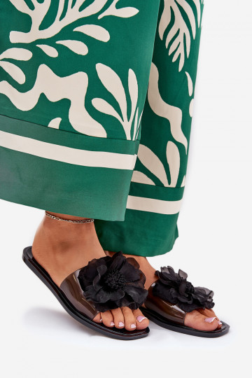 doorzichtige platte Dames pantoffels met kunstbloem in zwart Vobetta