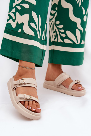 Dames slippers met plateau in goudkleur met gespen in zandkleur INernone